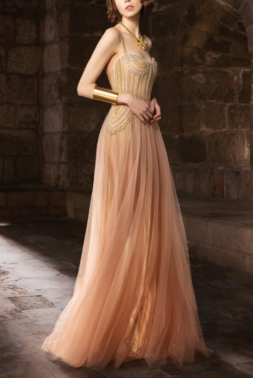 Golden Gown With Cascading Gold Chains