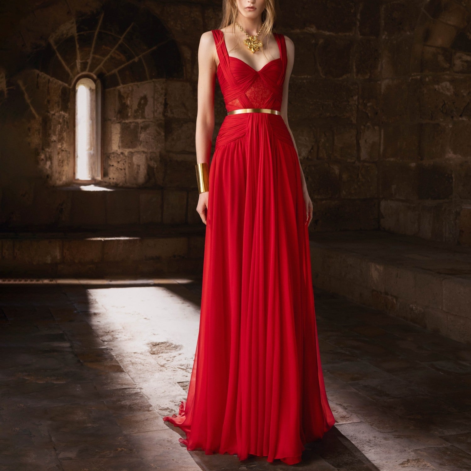 Red Mousseline Gown With A Heart Shape Bodice