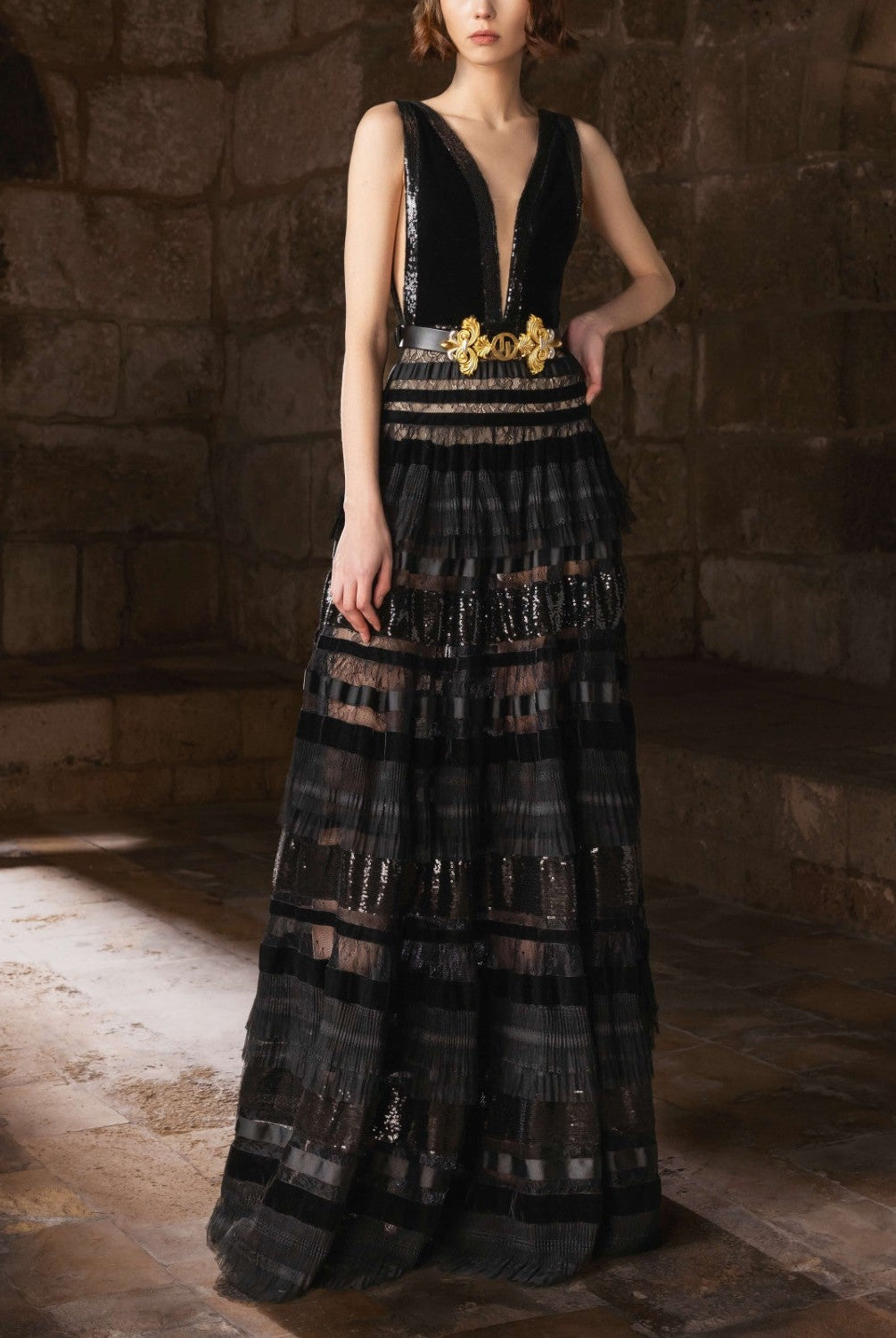 A black gown with a deep V-neck