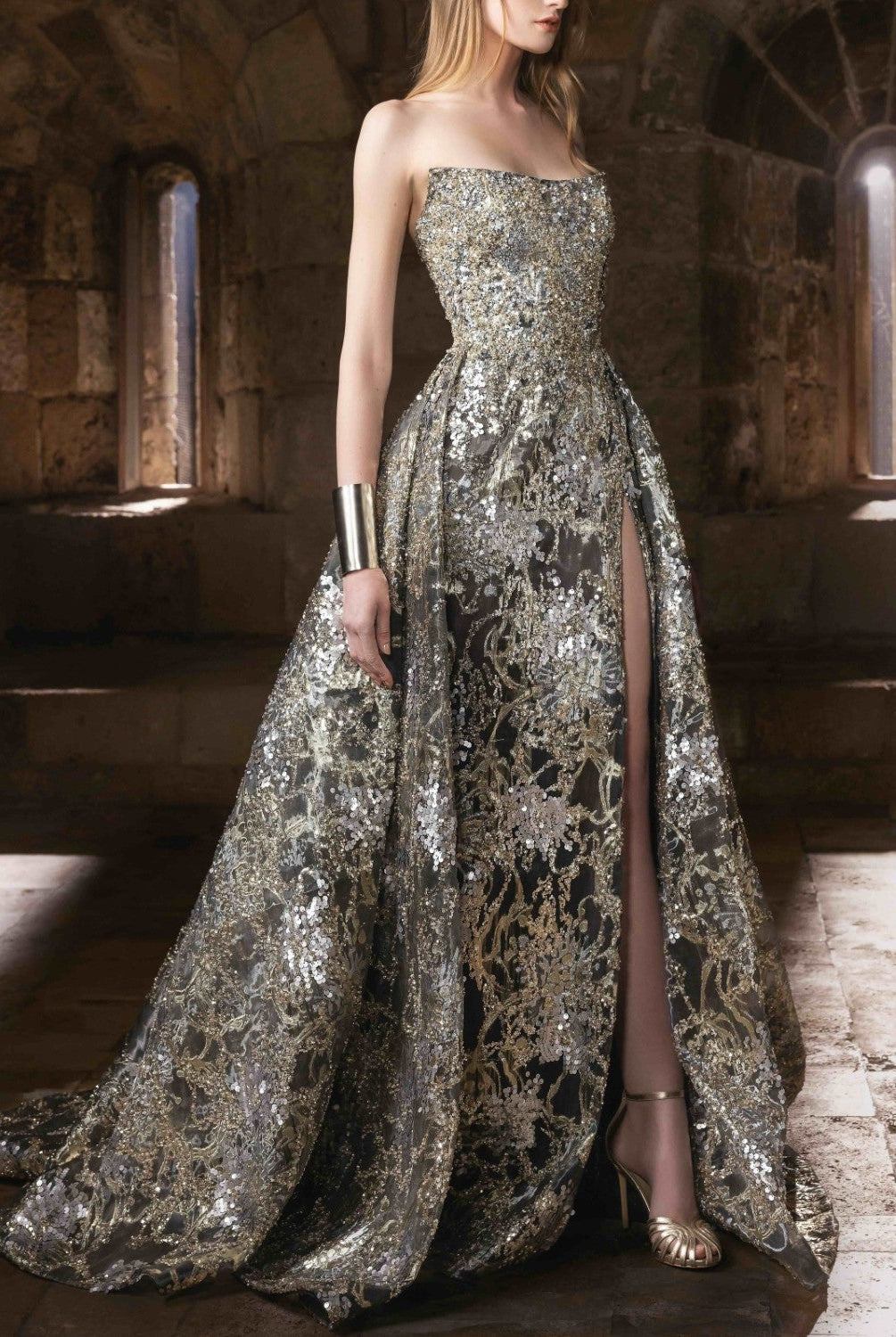 A strapless metallic gown with intricate embroidery