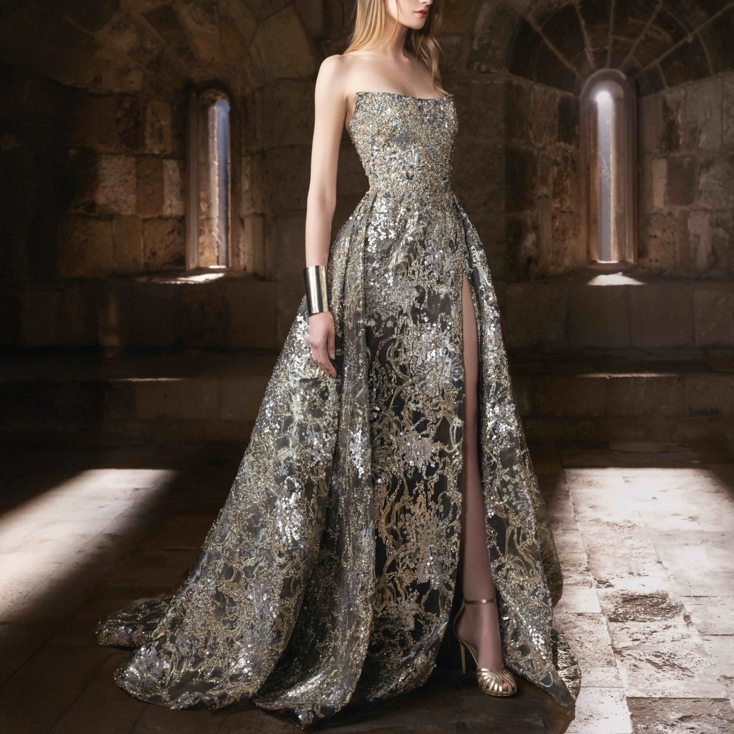A strapless metallic gown with intricate embroidery