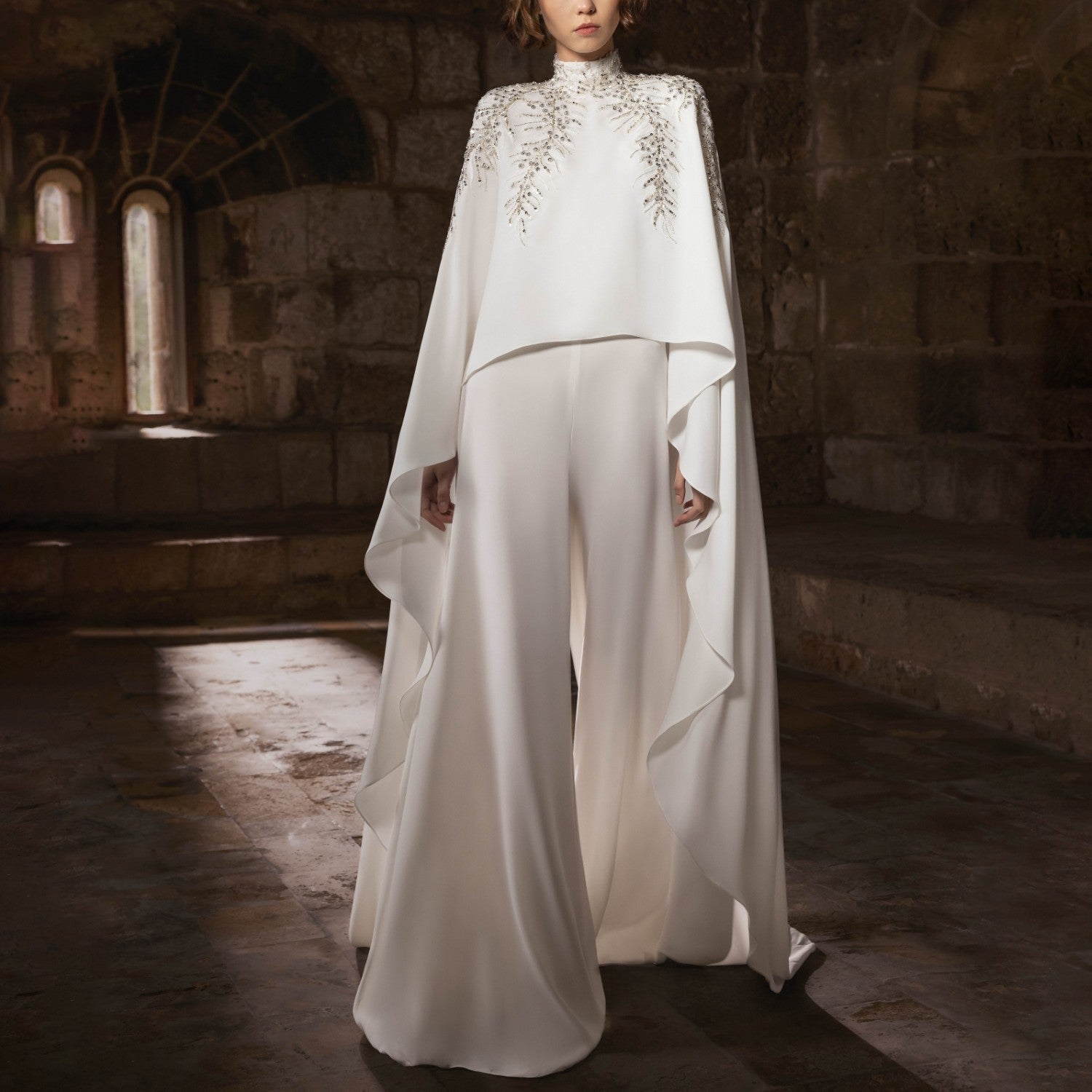 High-Neck White Crepe Jumpsuit with Embroidered & Cape Detail