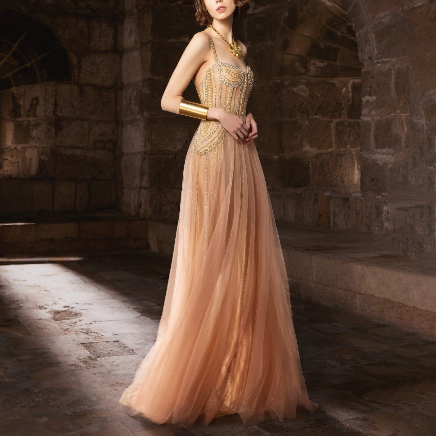 Golden Gown With Cascading Gold Chains