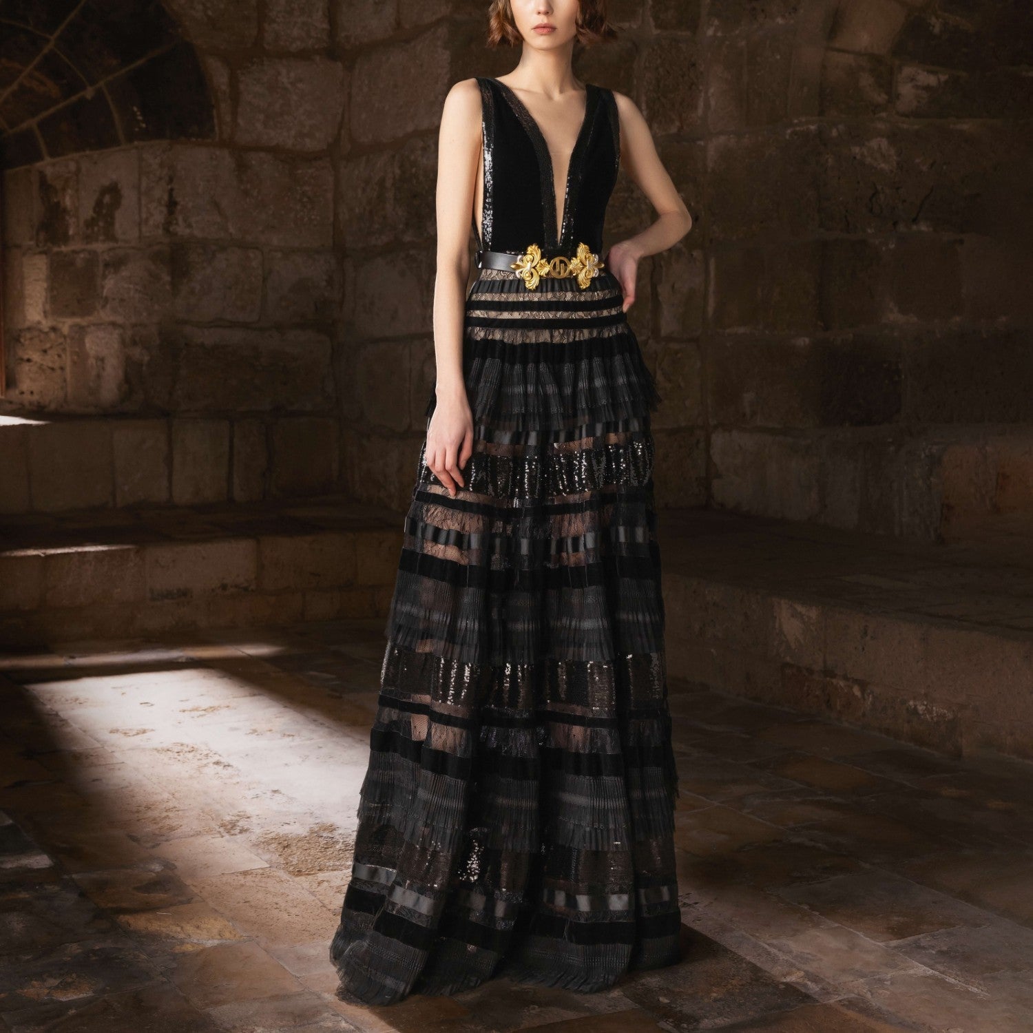 A black gown with a deep V-neck