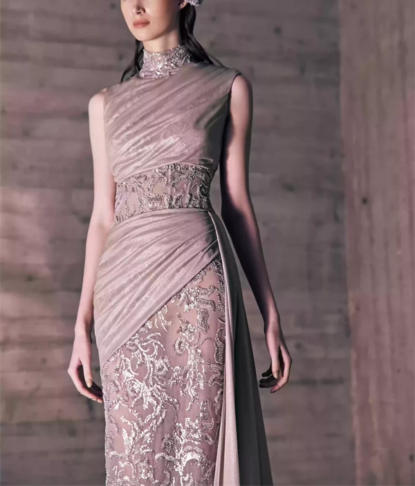 Silver Embroidered Tulle Dress With Sheer Play And An
Asymmetrical Jersey Draping